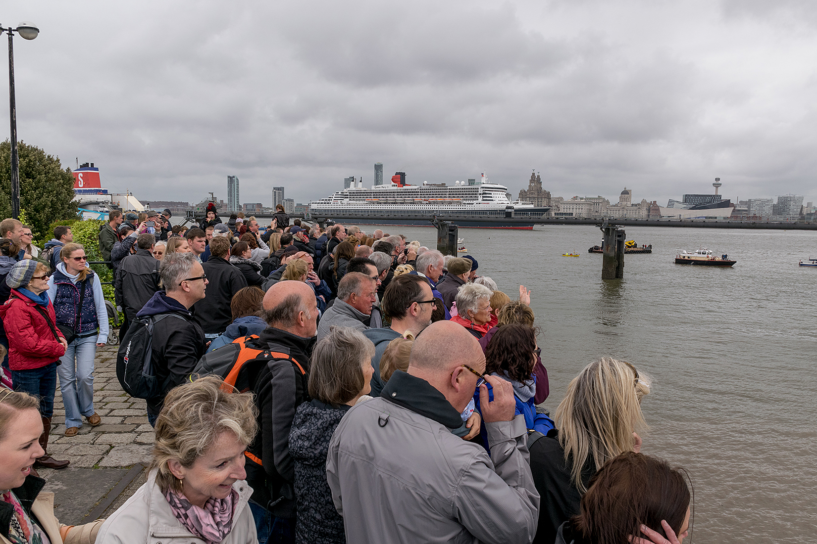Hundreds of thousands of spectators lined the Mersey to watch the Three Queens make maritime history