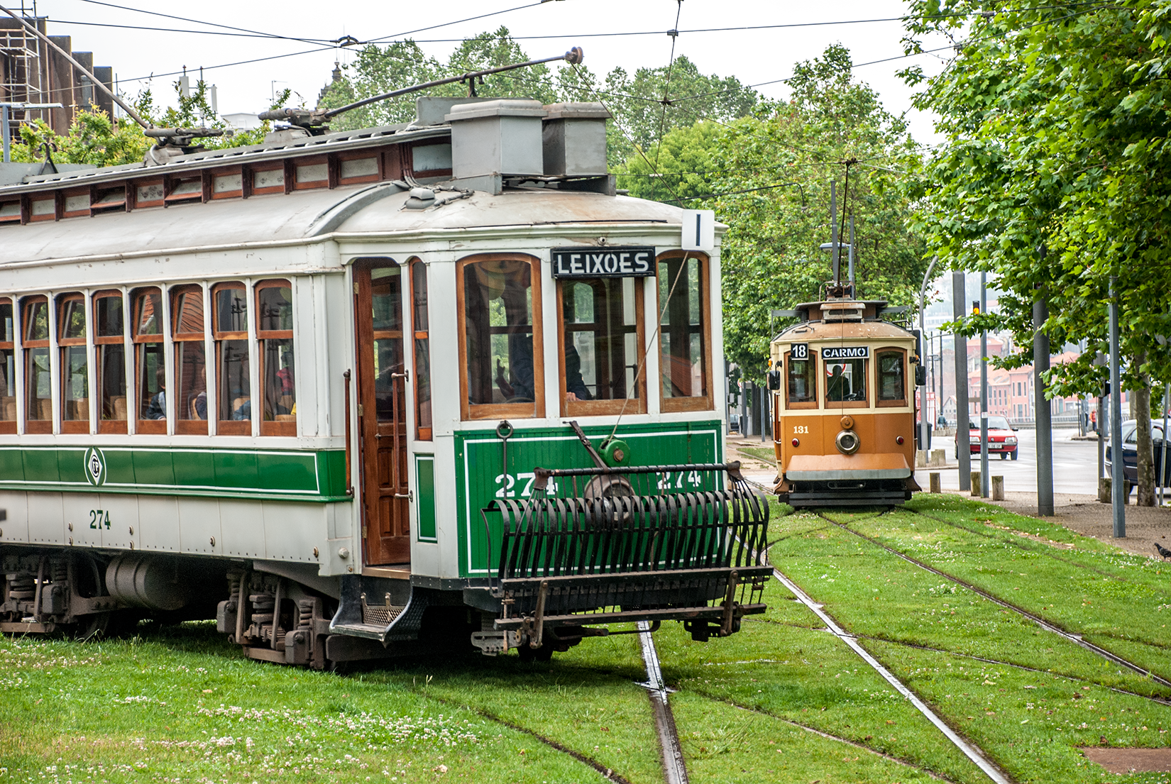 Brill type bogie car 274 and four-wheel car 131 outside the Tram Museum