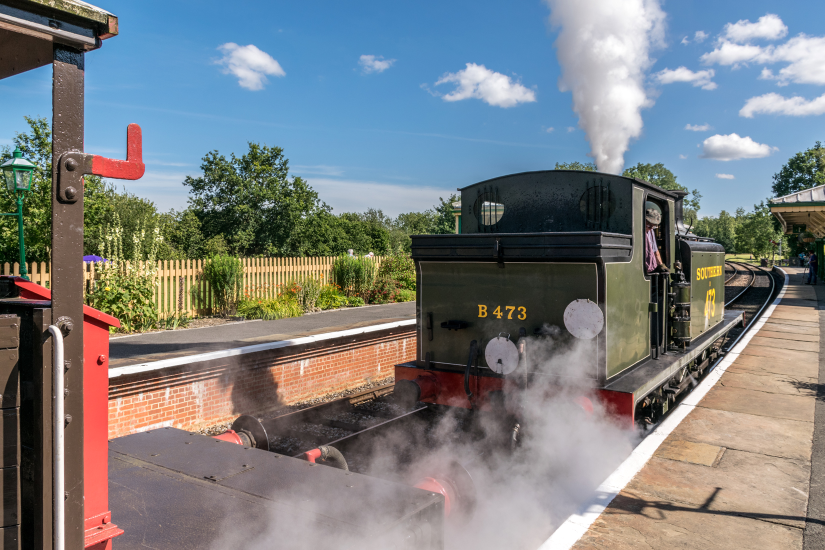 B473 completes its 'run round' ready to be coupled to the last wagon in the train - the guards van
