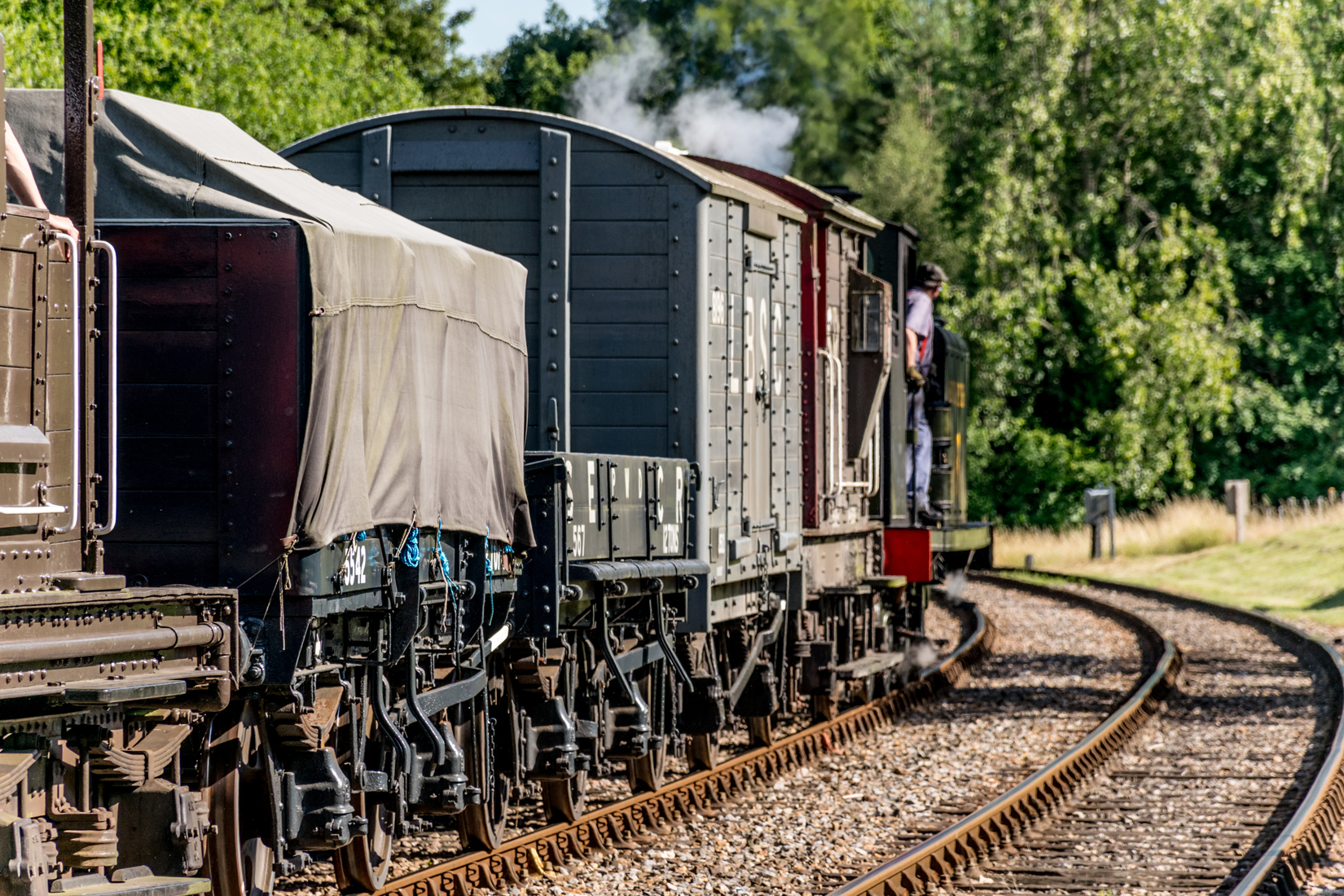 The short goods train heads south from Kingscote at the end of its shunting activities