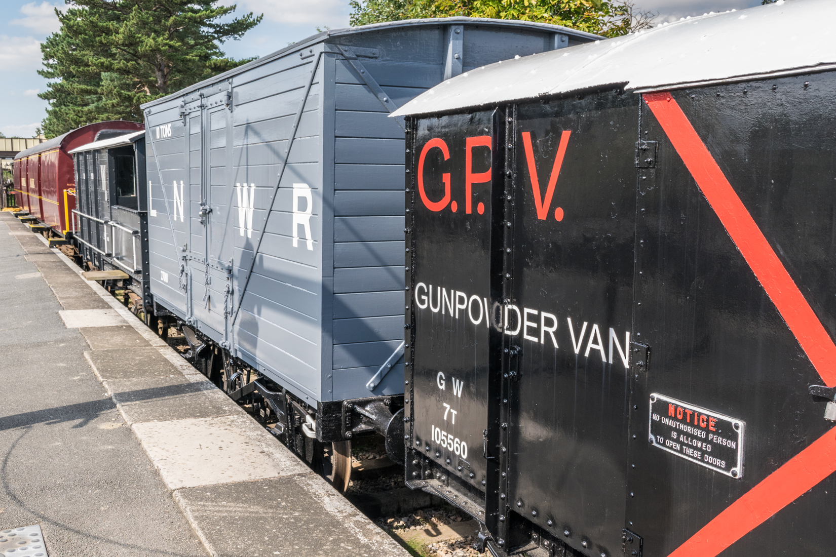 A varied collection of restored goods wagons and a travelling postal sorting office