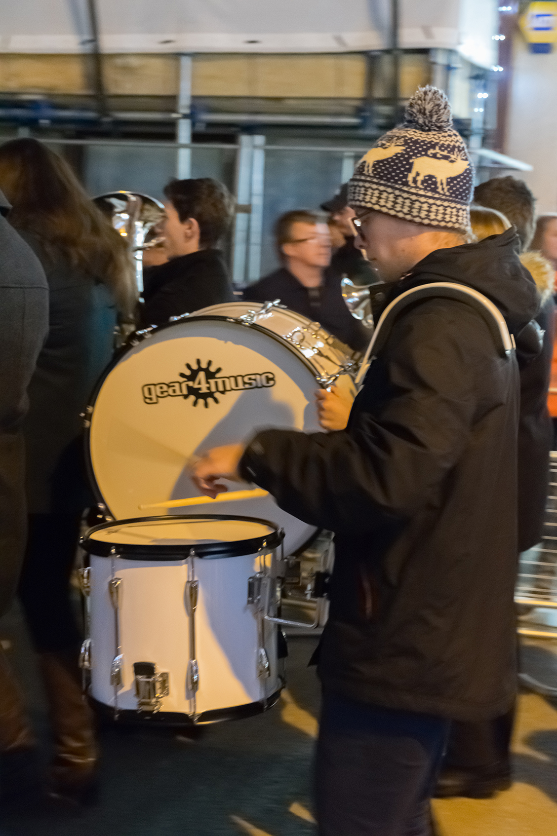 The procession is accompanied by marching bands