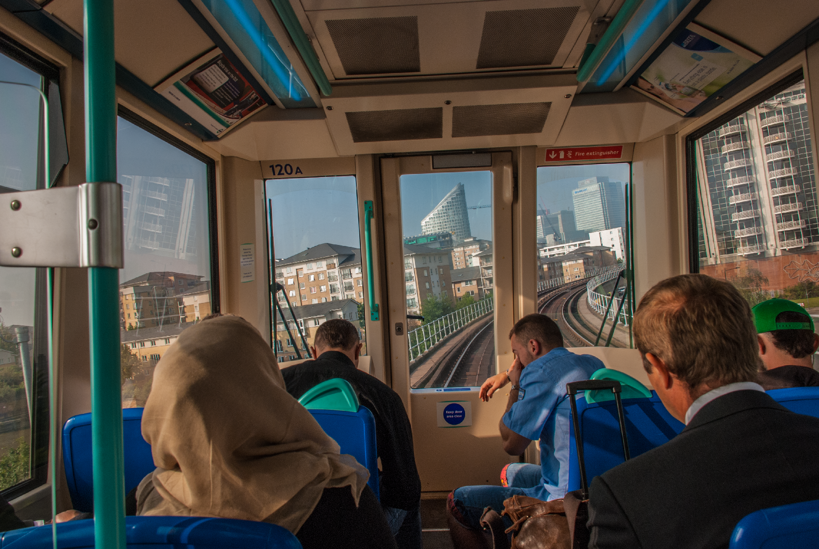 The short wheelbase of the DLR trains allows for sharp radius curves and steep banking