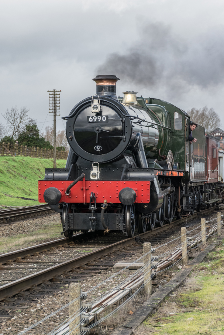 6990 Witherslack Hall leaving Quorn and Woodhouse with the demonstration freight train. 6990 Witherslack Hall leaving Quorn and Woodhouse with the demonstration freight train.