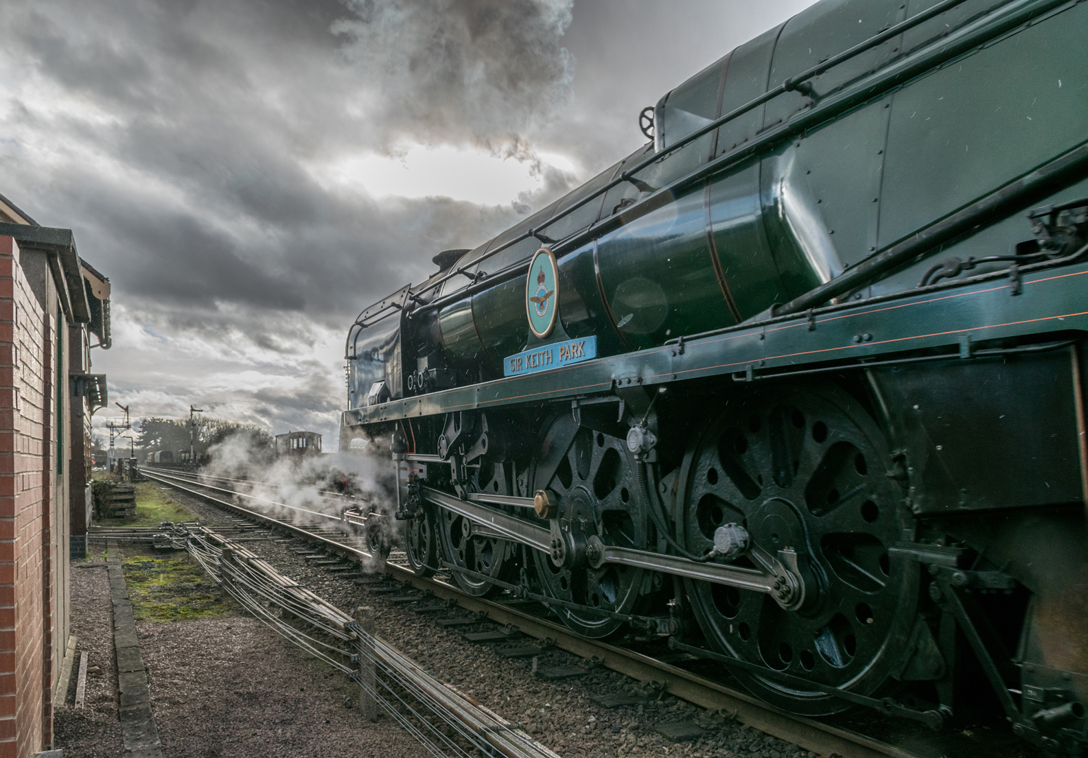 34053 Sir Keith Park passing Quorn and Woodhouse signal cabin.