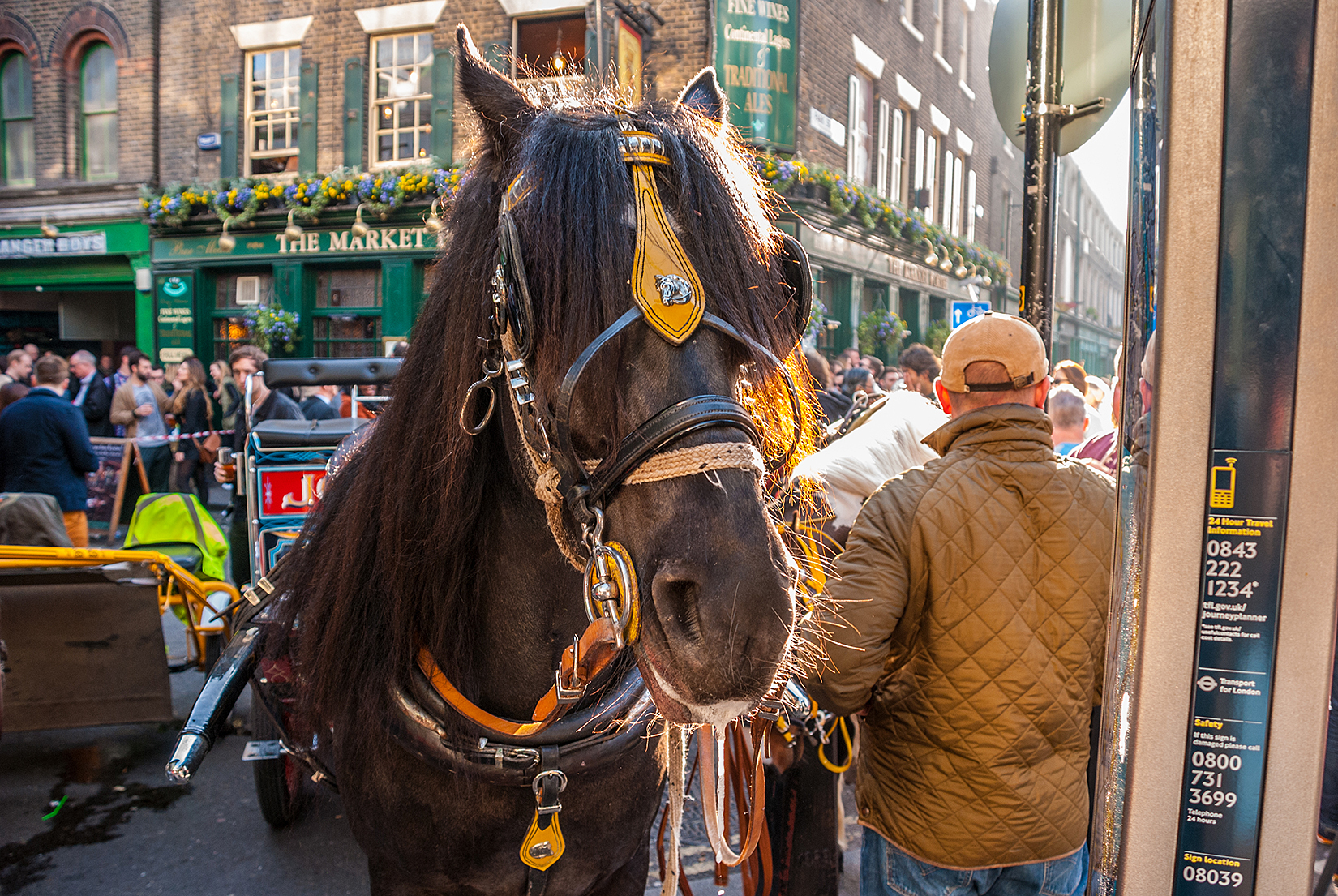Horse-drawn carriage outside the Market Trader pub
