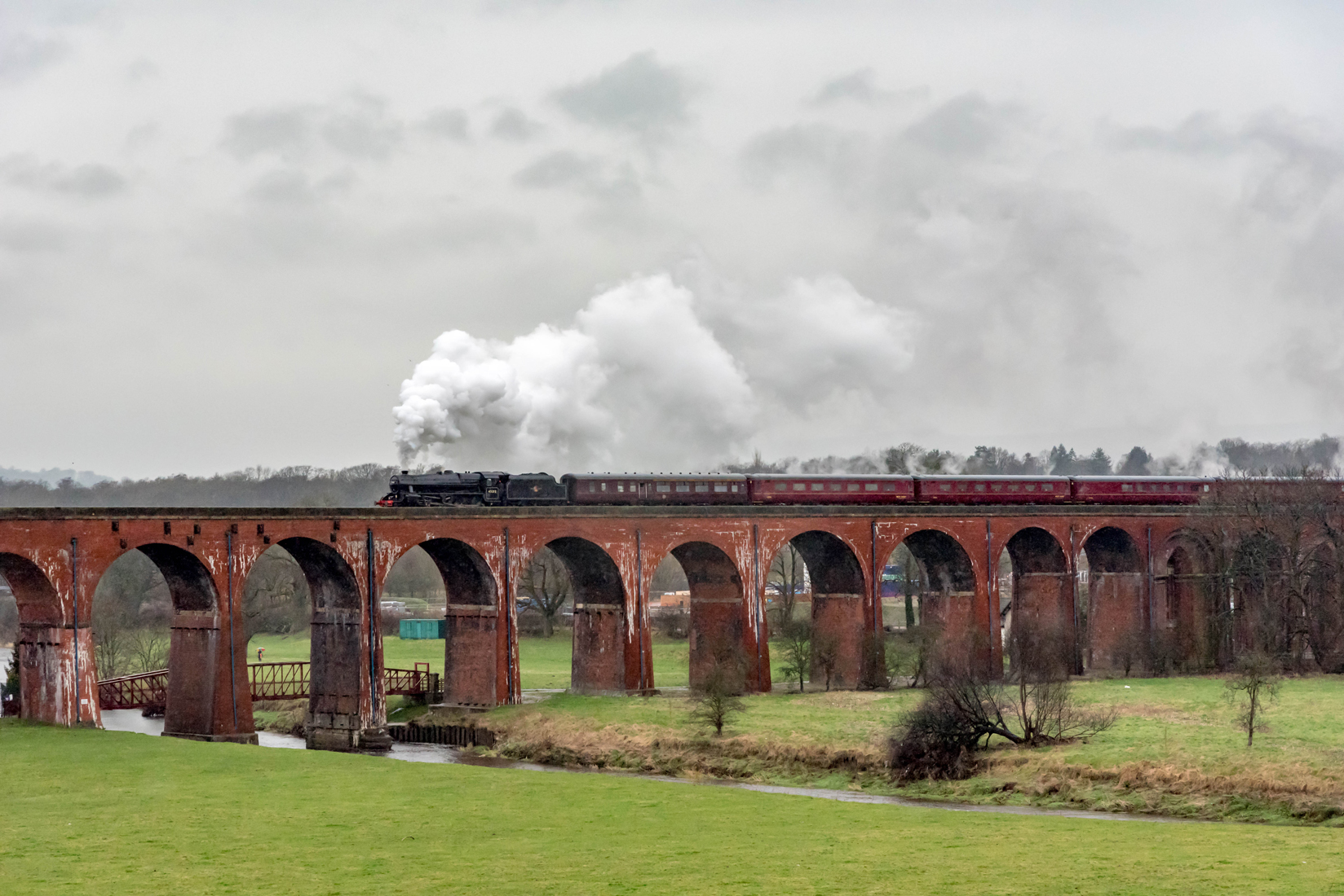 45212 crossing the River Calder on Whalley Viaduct.