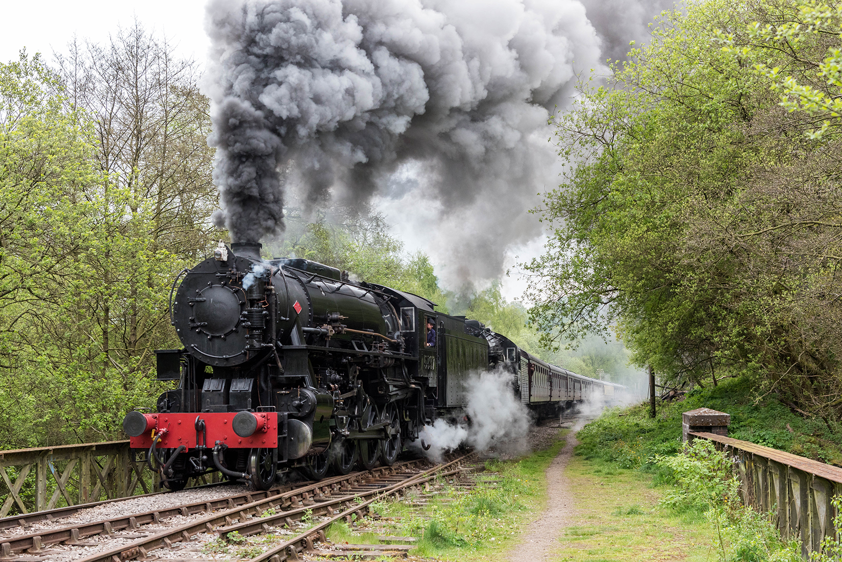 5197 and 6046 storming through Leek Valley Junction at the start of the climb to Ipstones. 5197 and 6046 storming through Leek Valley Junction at the start of the climb to Ipstones.