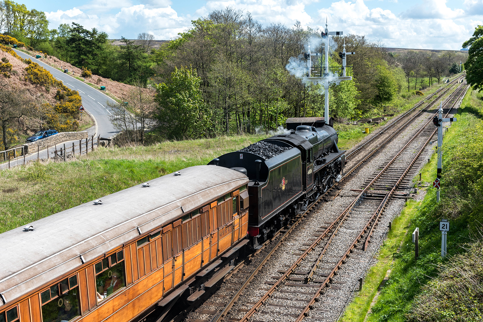 44806 heads out of Goathland hauling ex-LNER 'teak' coaches
