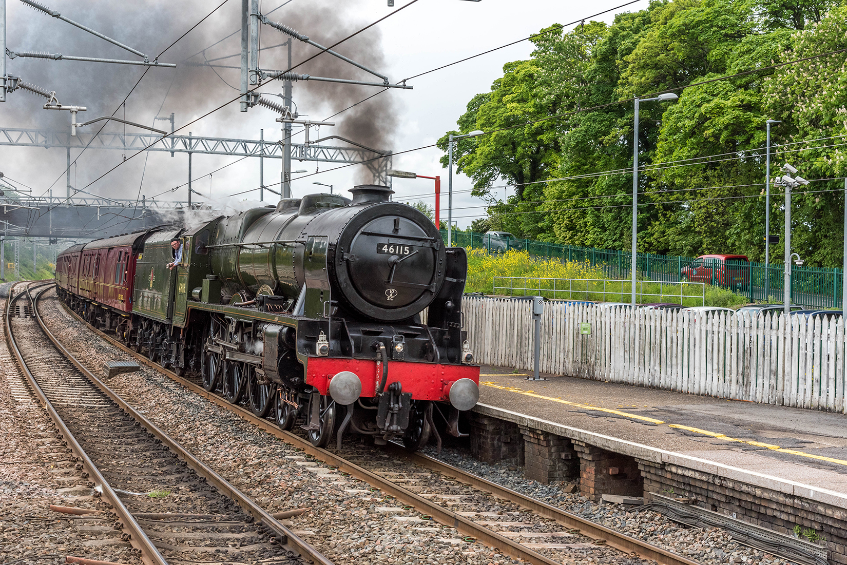 Royal Scot class 46115 'Scots Guardsman' thundering through Oxenholme station Royal Scot class 46115 'Scots Guardsman' thundering through Oxenholme station