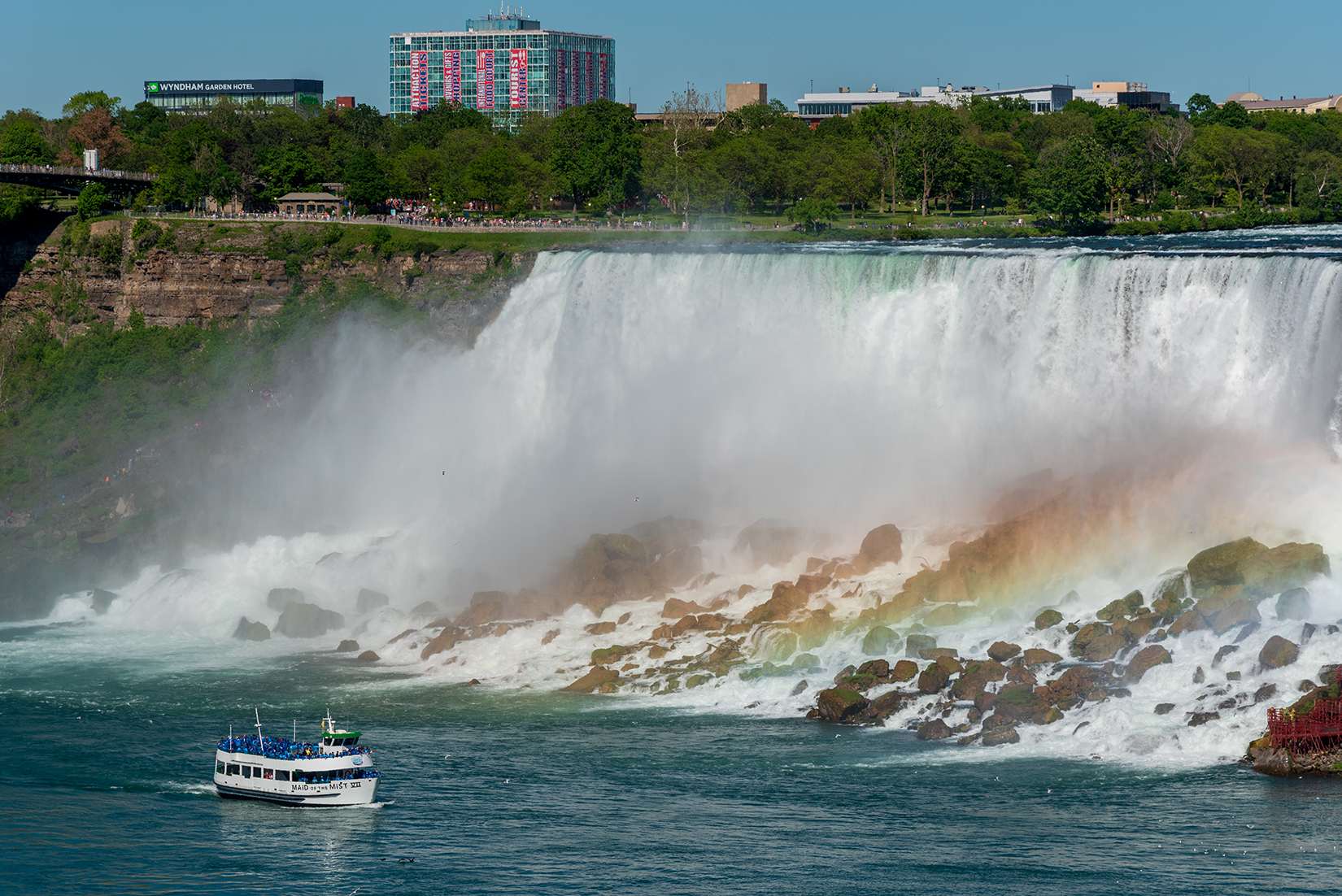'Maid of the Mist' cruise boat passing the American Falls