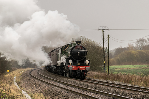 Link to The Cathedrals Express approaching Marsh Benham crossing